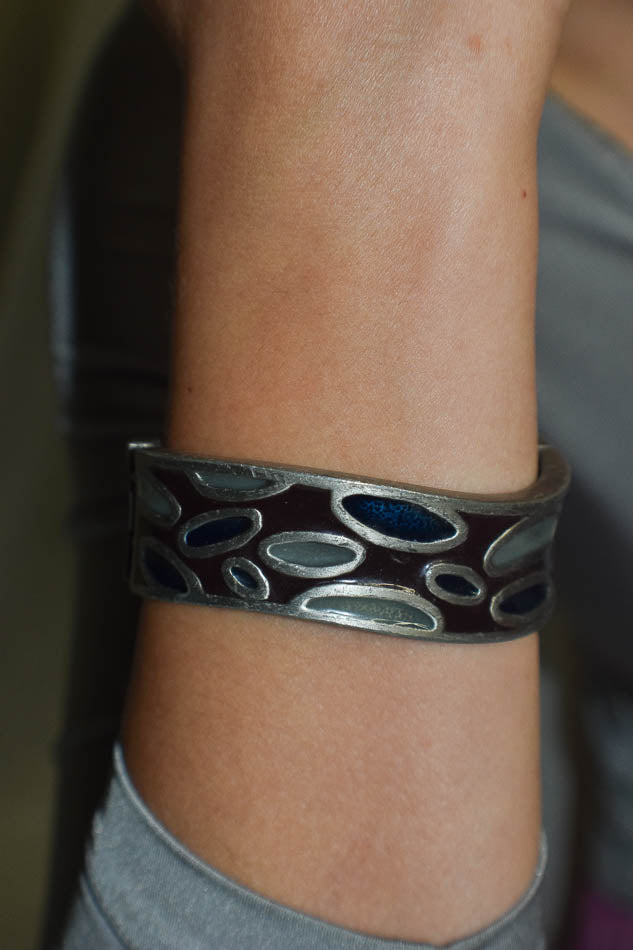 Metal Bangle with Oval Motifs