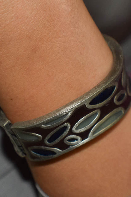 Metal Bangle with Oval Motifs