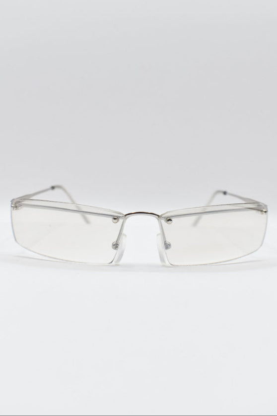 Clear rimless eyeglasses on a white background