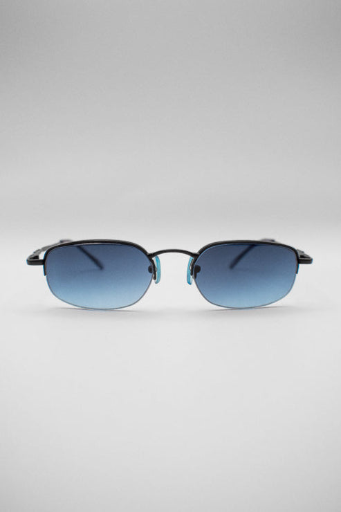 A pair of vintage blue tinted sunglasses with a black frame and arms, featuring a blue ombre tinted lens.