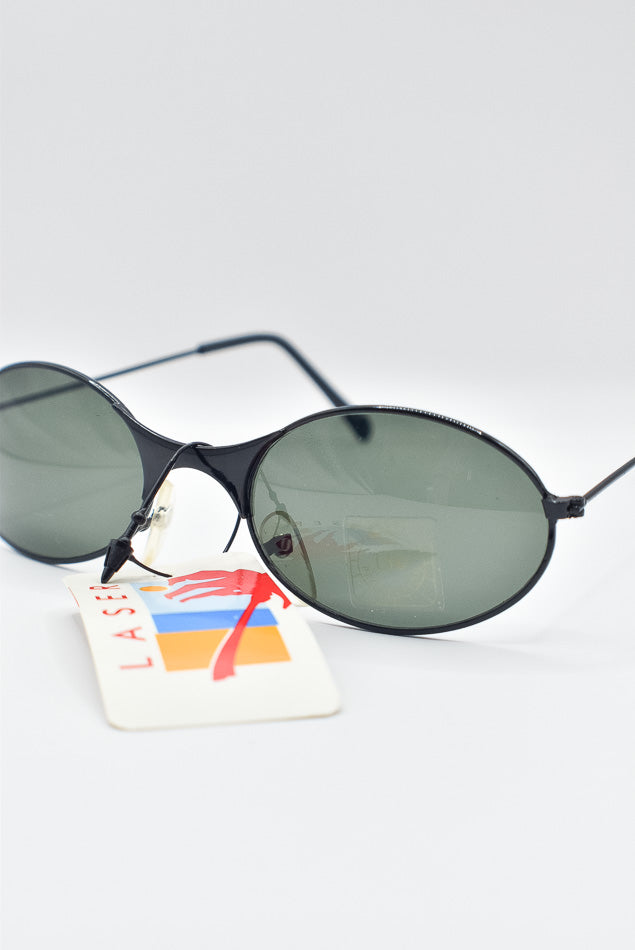 Round sunglasses with dark lenses on a white background