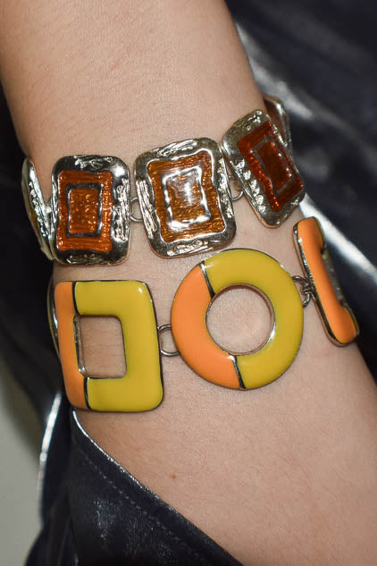 Colorful bracelet on a wrist with a blurred background