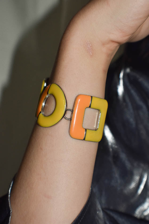 Colorful bracelet on a wrist with a blurred background